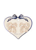 Heart-shaped card with sequin bow earrings on a white background