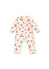 A floral-patterned newborn onesie with long sleeves, featuring snap buttons. The color palette is mainly beige with red and green accents.