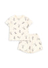 Children's pajama set with horse pattern on a white background