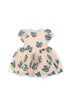 A tulle dress with all-over sequin applications, featuring puff sleeves and a voluminous skirt.