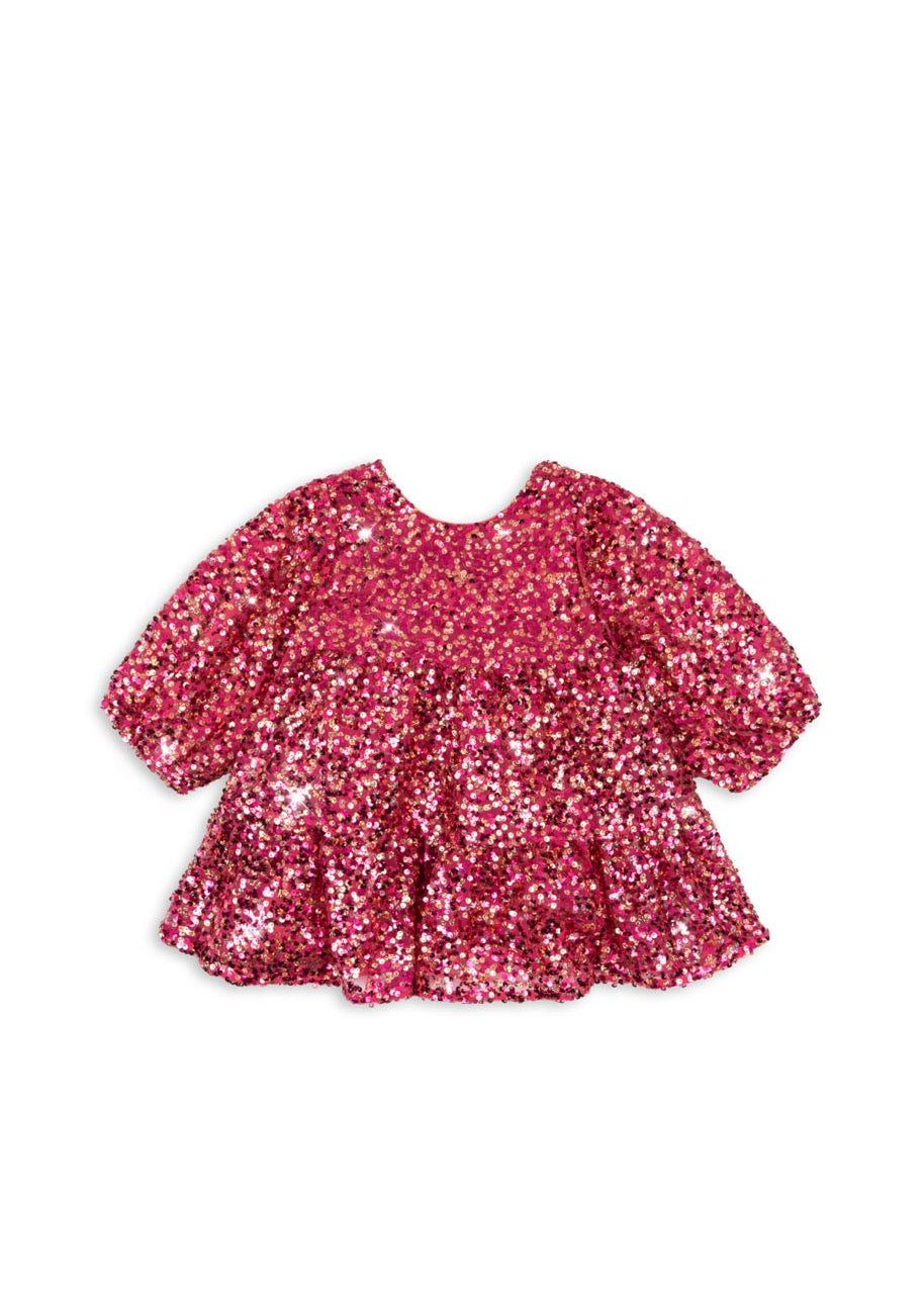 Pink sequin dress on a white background