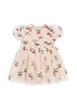 A short-sleeved baby dress with a floral cherry pattern on a light background, featuring a ruched top part with sheer tulle and a voluminous skirt.