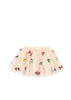 Beige tulle skirt with colorful bow decorations on a white background