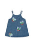 Blue denim dress with butterfly patterns on a white background