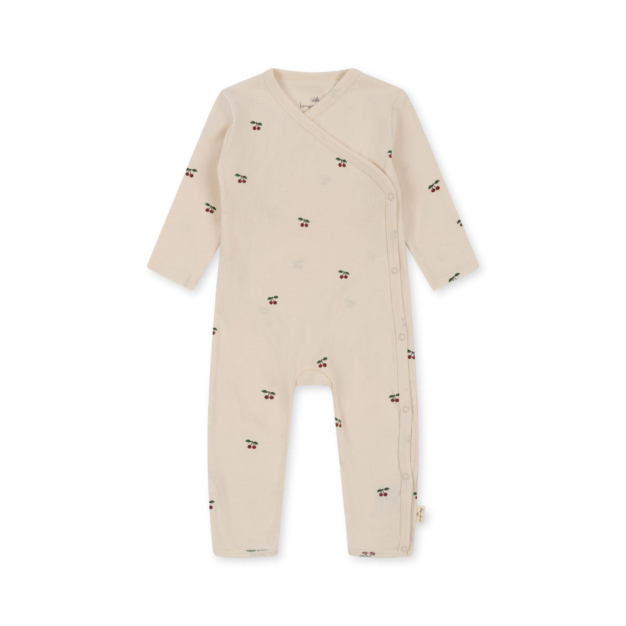 Beige baby onesie with small patterns on a white background